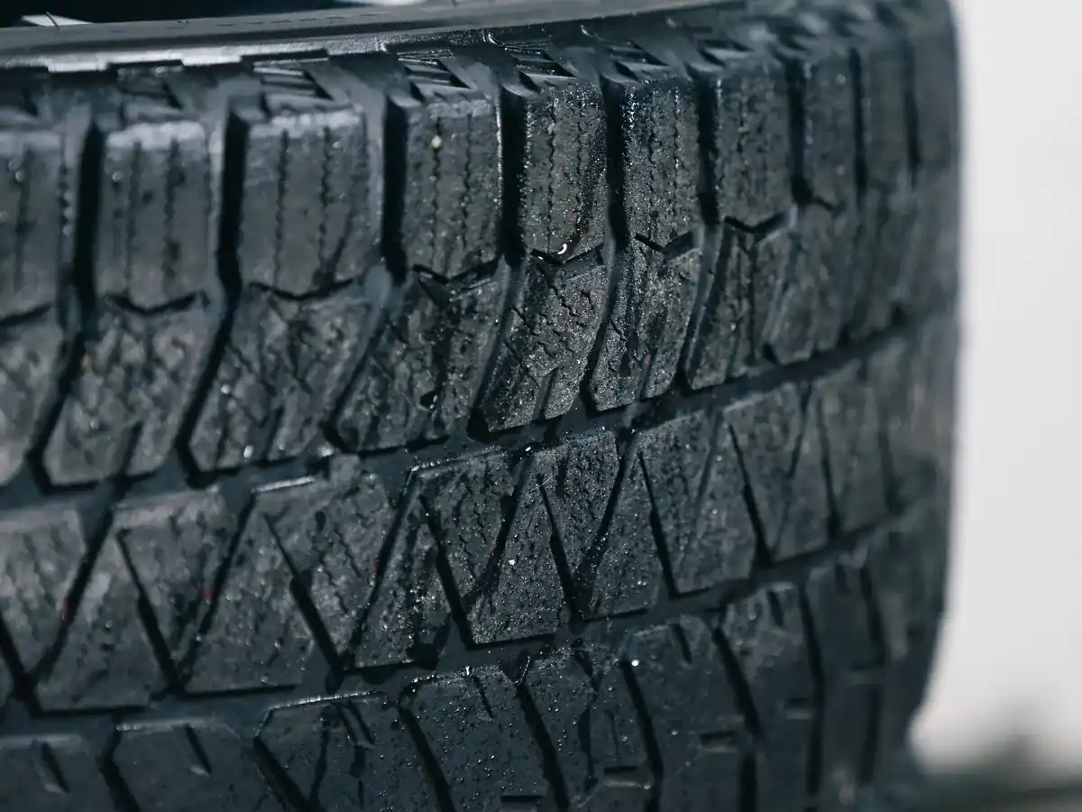Close-up of the tread on a stack of car tyres